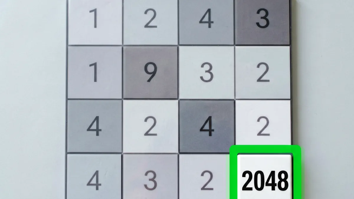 2048核基地攻略卡片：展示角落战术中右下角固定2048数字块的棋盘布局示意图